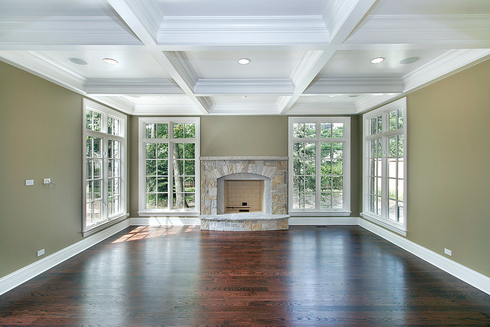 Large traditional enclosed games room in Chicago with green walls, dark hardwood flooring, a standard fireplace and a stone fireplace surround.