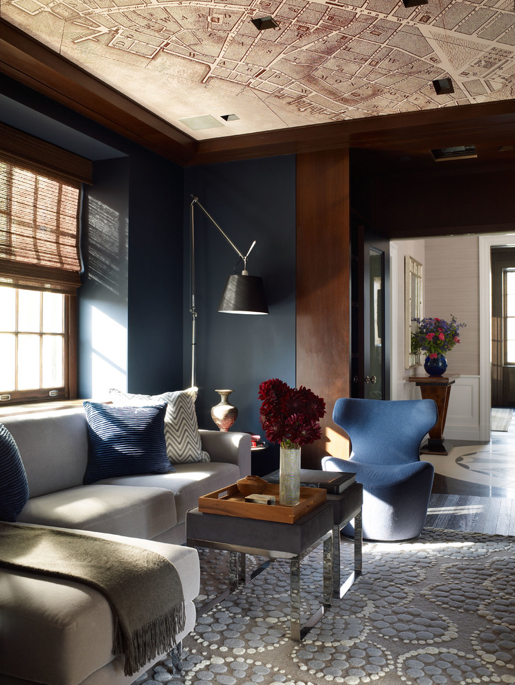 Inspiration for a transitional enclosed family room remodel in New York with blue walls