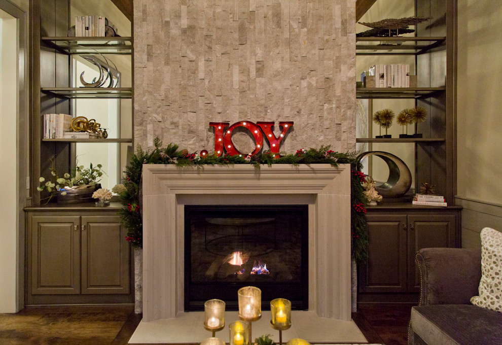 Inspiration for a mid-sized transitional enclosed brown floor family room remodel in Kansas City with beige walls, a standard fireplace and a concrete fireplace