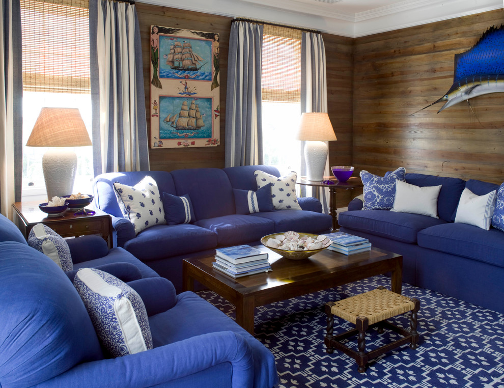 Immagine di un grande soggiorno stile marinaro aperto con pareti marroni e parquet scuro