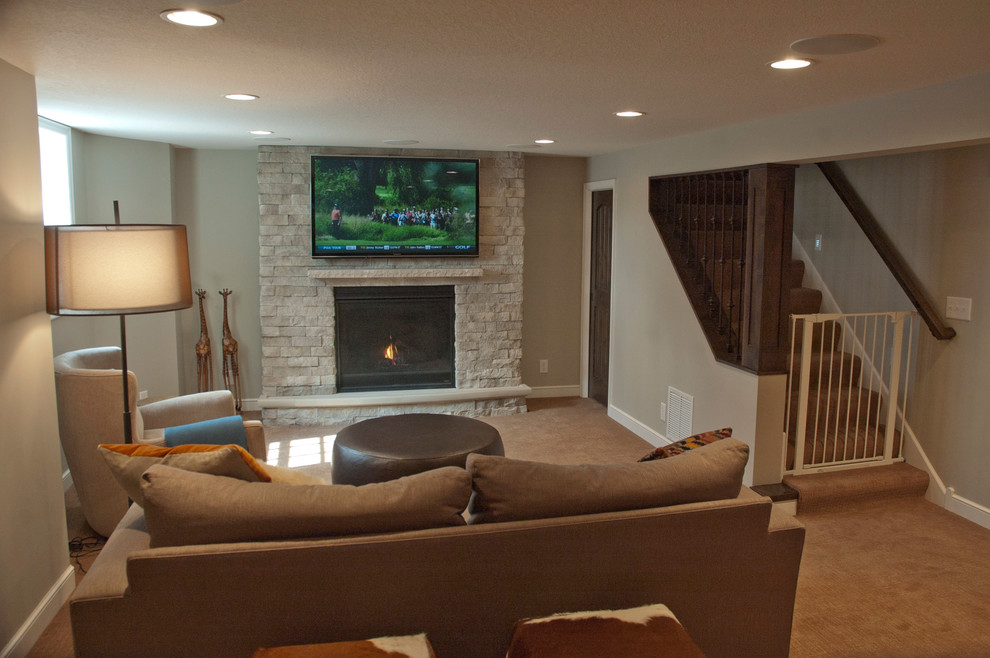 Large contemporary enclosed games room in Minneapolis with beige walls, carpet, a standard fireplace, a brick fireplace surround and brown floors.