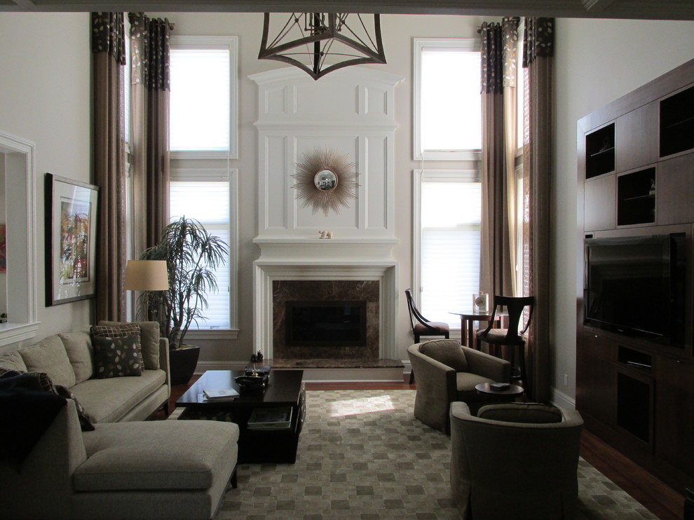 Example of a mid-sized trendy open concept carpeted and gray floor family room design in New York with white walls, a standard fireplace, a tile fireplace and a media wall