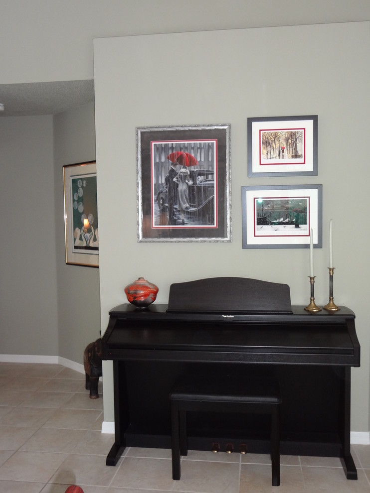 Mid-sized eclectic open concept ceramic tile family room photo in Tampa with a tv stand and gray walls