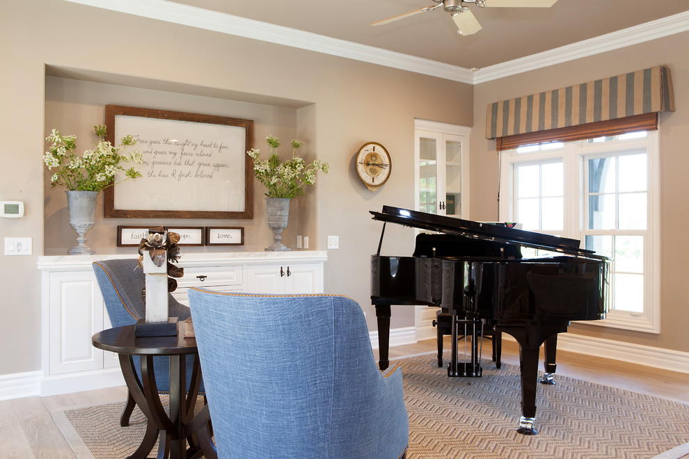 Inspiration for a medium sized traditional open plan games room in Orange County with a music area, brown walls and light hardwood flooring.