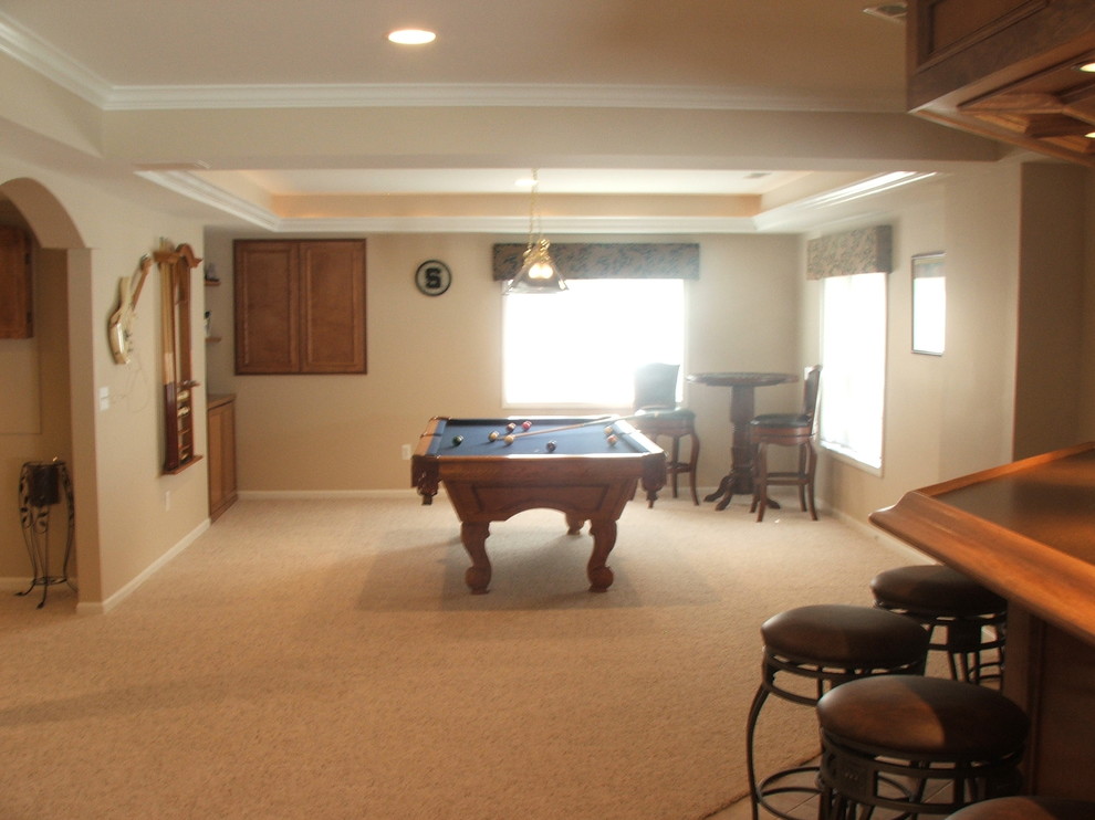 Photo of a traditional enclosed games room in Detroit with a game room, beige walls and carpet.