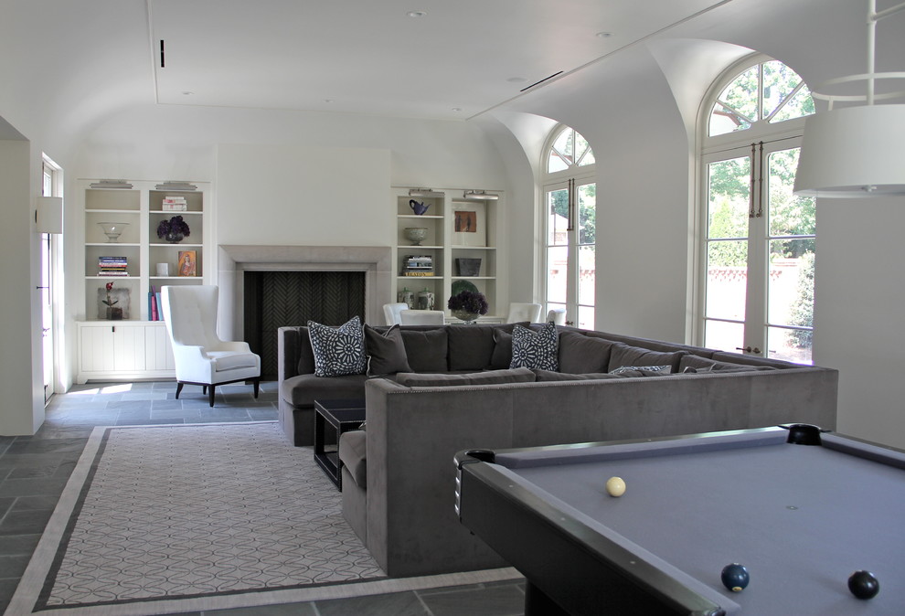 Huge transitional enclosed game room photo in Charlotte with white walls and a wall-mounted tv