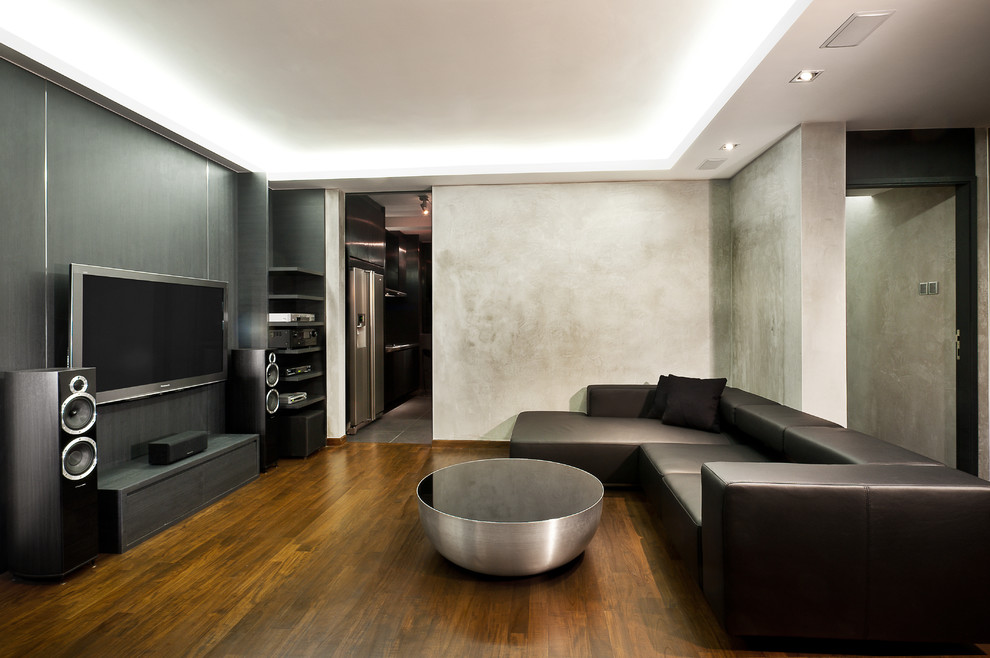 Design ideas for an urban games room in Singapore with dark hardwood flooring and a wall mounted tv.