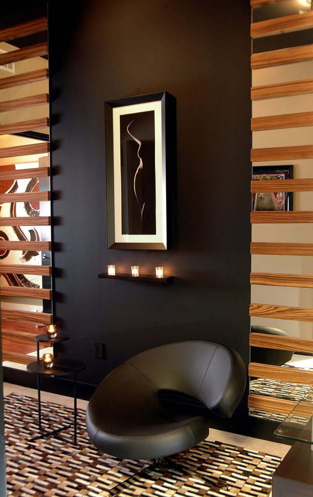 Inspiration for a medium sized contemporary enclosed games room in Atlanta with black walls and travertine flooring.