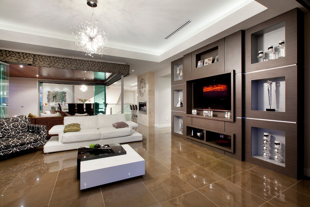 Trendy open concept brown floor family room photo in Perth with beige walls and a media wall