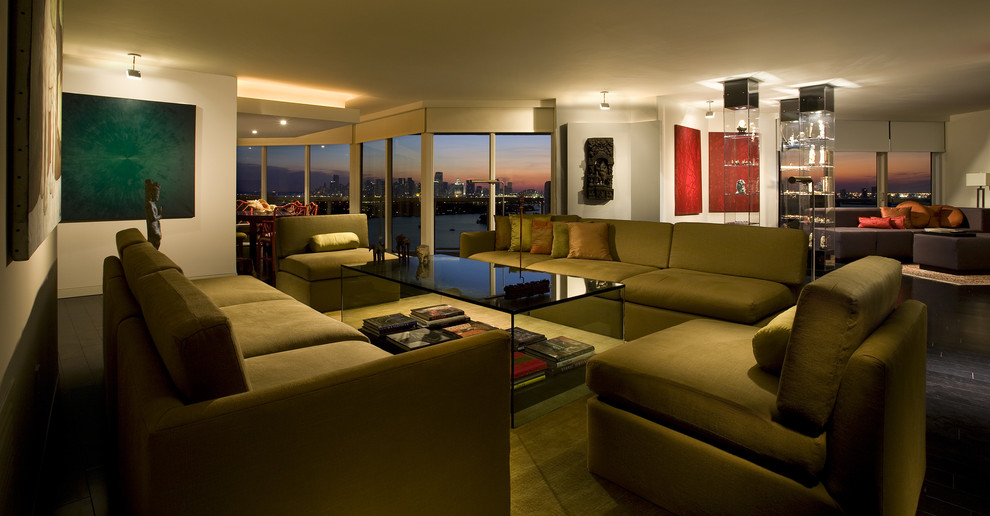 This is an example of a contemporary open plan games room in Miami with beige walls.