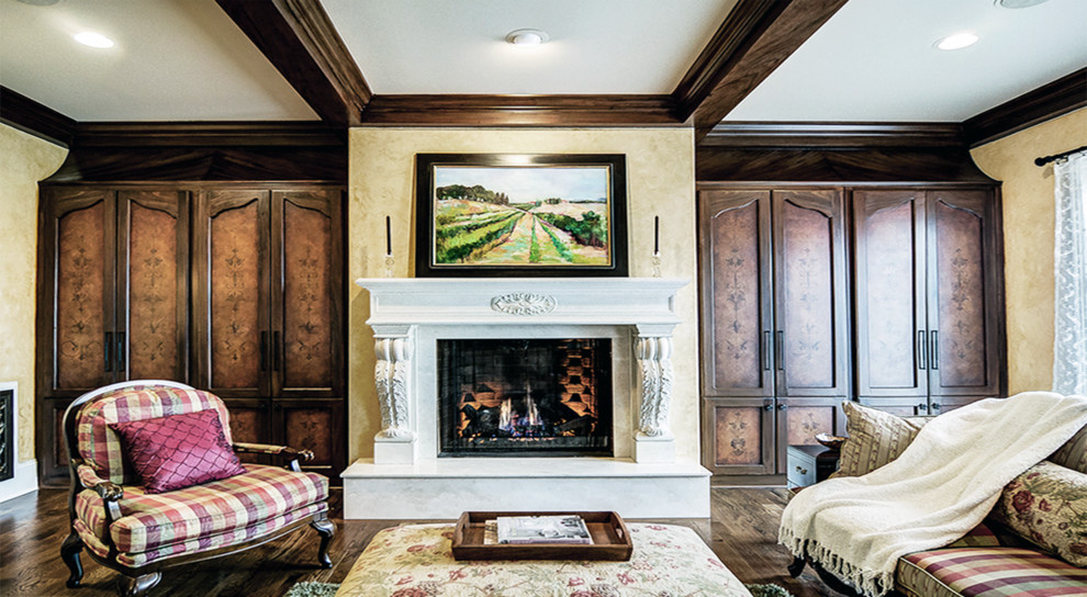 This is an example of a large mediterranean open plan games room in Nashville with a music area, yellow walls and a plastered fireplace surround.