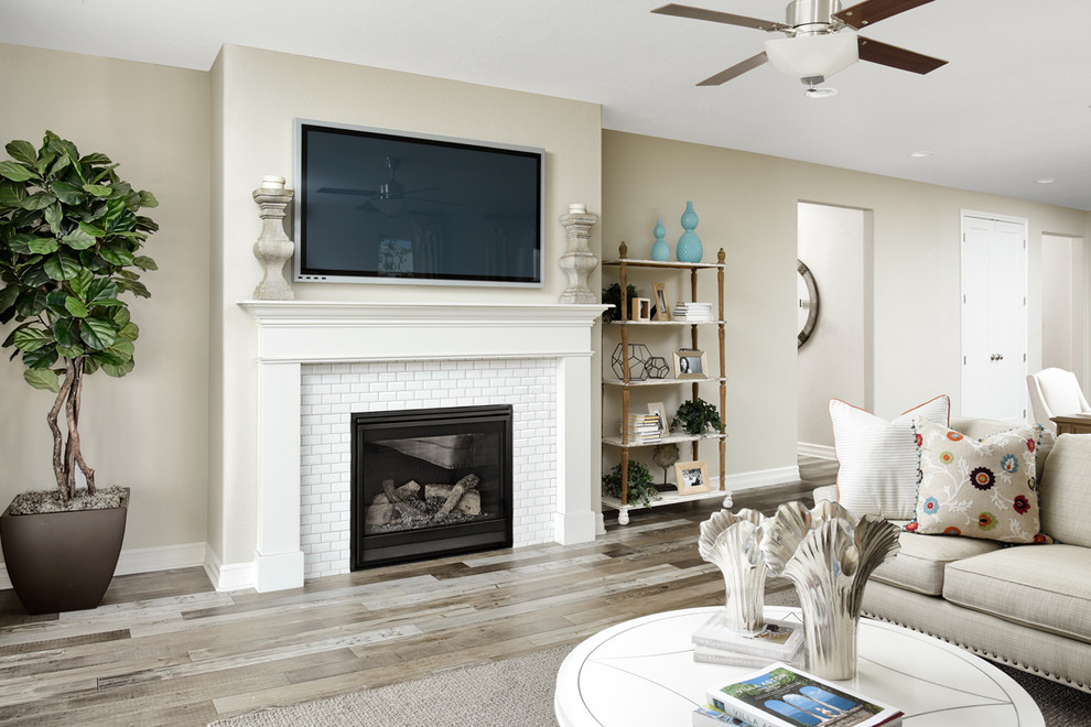 Family room - contemporary open concept family room idea in Denver with a wall-mounted tv
