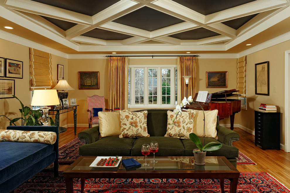 Example of a large classic enclosed light wood floor family room design in DC Metro with a music area, yellow walls, a standard fireplace, a stone fireplace and a wall-mounted tv
