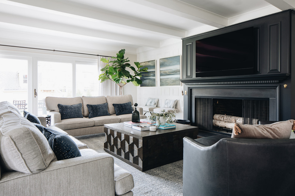 Inspiration for a mid-sized timeless open concept medium tone wood floor, brown floor and wall paneling family room remodel in Chicago with a bar, gray walls, a standard fireplace, a stone fireplace and a wall-mounted tv