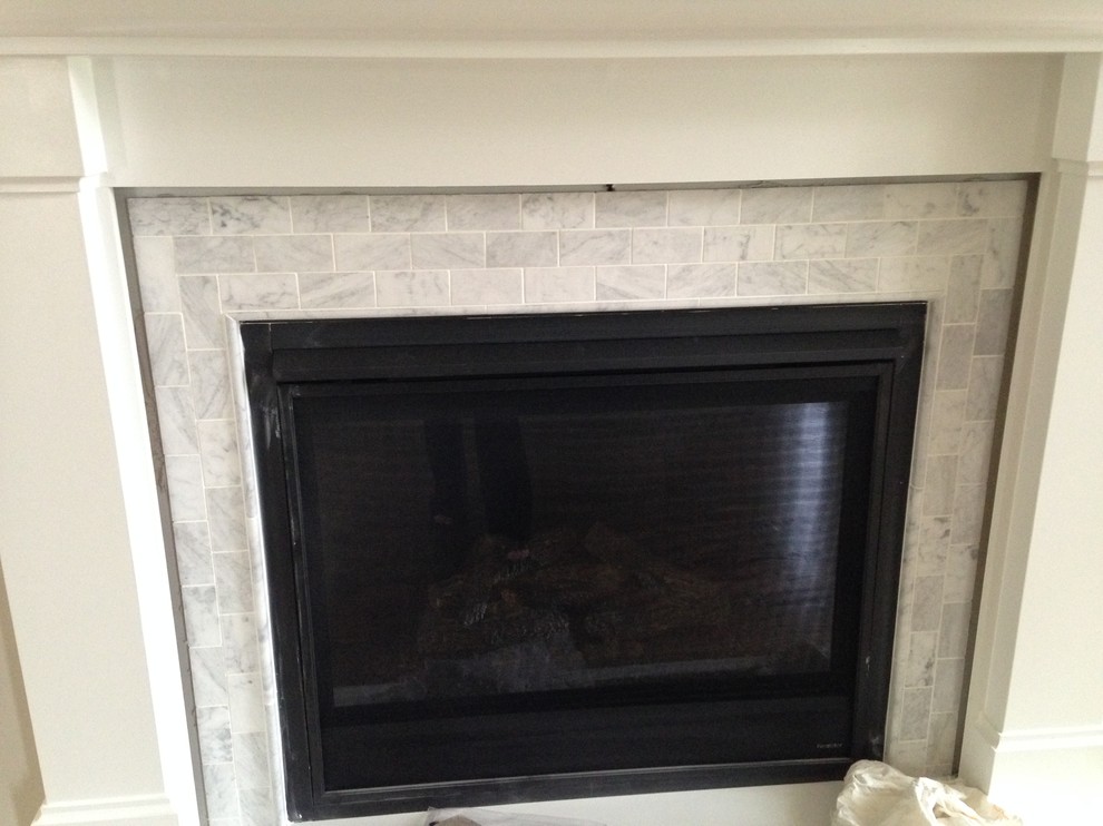 Example of a mid-sized trendy family room design in Philadelphia with a tile fireplace and a standard fireplace