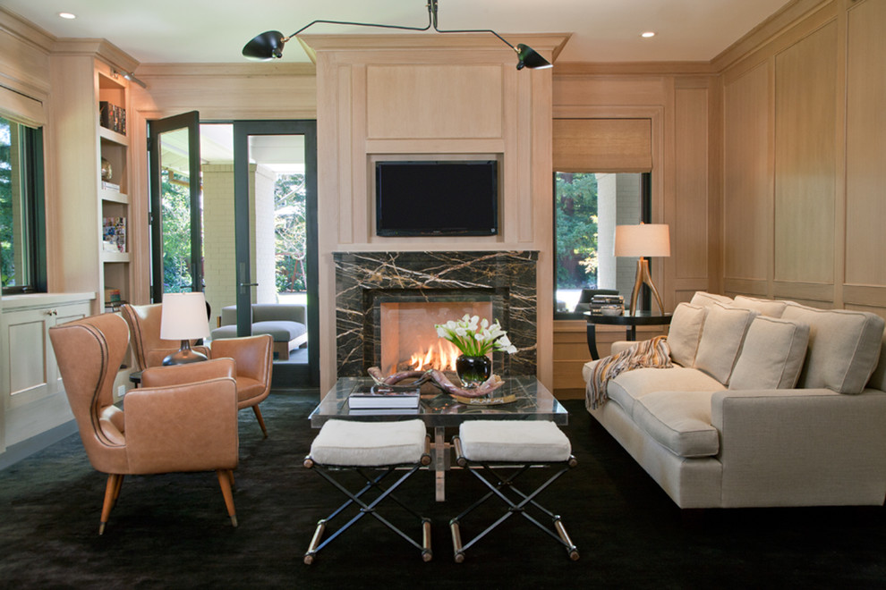 Mid-sized trendy open concept carpeted family room library photo in San Francisco with beige walls, a standard fireplace, a wall-mounted tv and a stone fireplace
