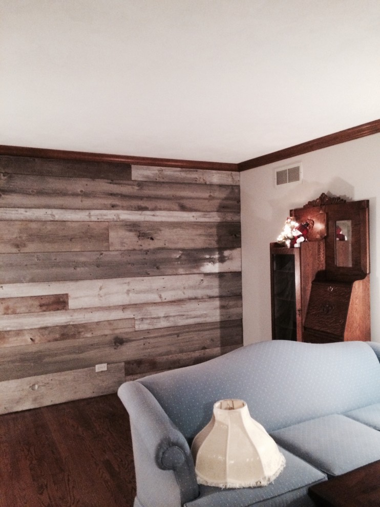 Example of a farmhouse family room design in Chicago