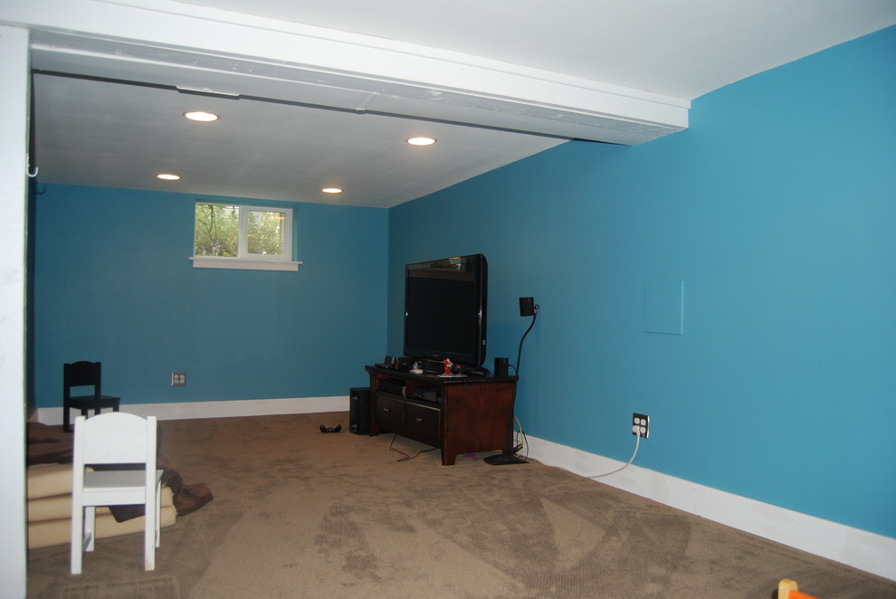Photo of a medium sized modern enclosed games room in Portland with a game room, blue walls, carpet, no fireplace and a freestanding tv.
