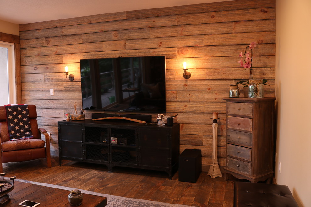 Immagine di un soggiorno minimal di medie dimensioni e aperto con TV autoportante