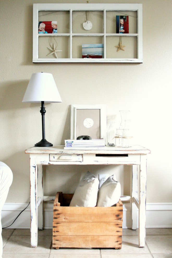Family room - shabby-chic style family room idea in Dallas with beige walls