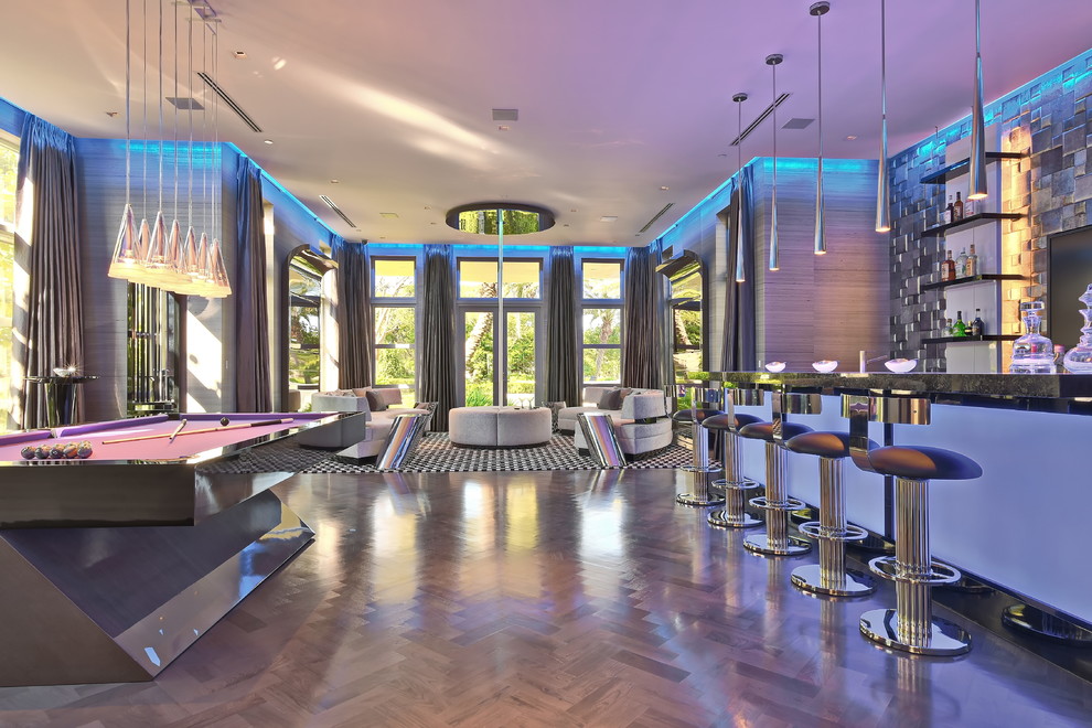 Photo of an expansive contemporary enclosed games room in Miami with a home bar, grey walls, dark hardwood flooring and a wall mounted tv.
