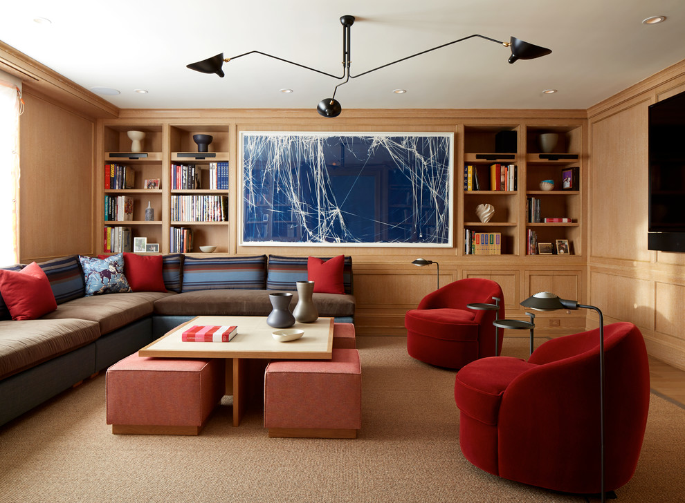 Ispirazione per un soggiorno tradizionale con libreria e TV a parete