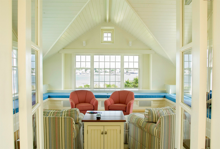 Inspiration for a coastal light wood floor family room remodel in Bridgeport with white walls
