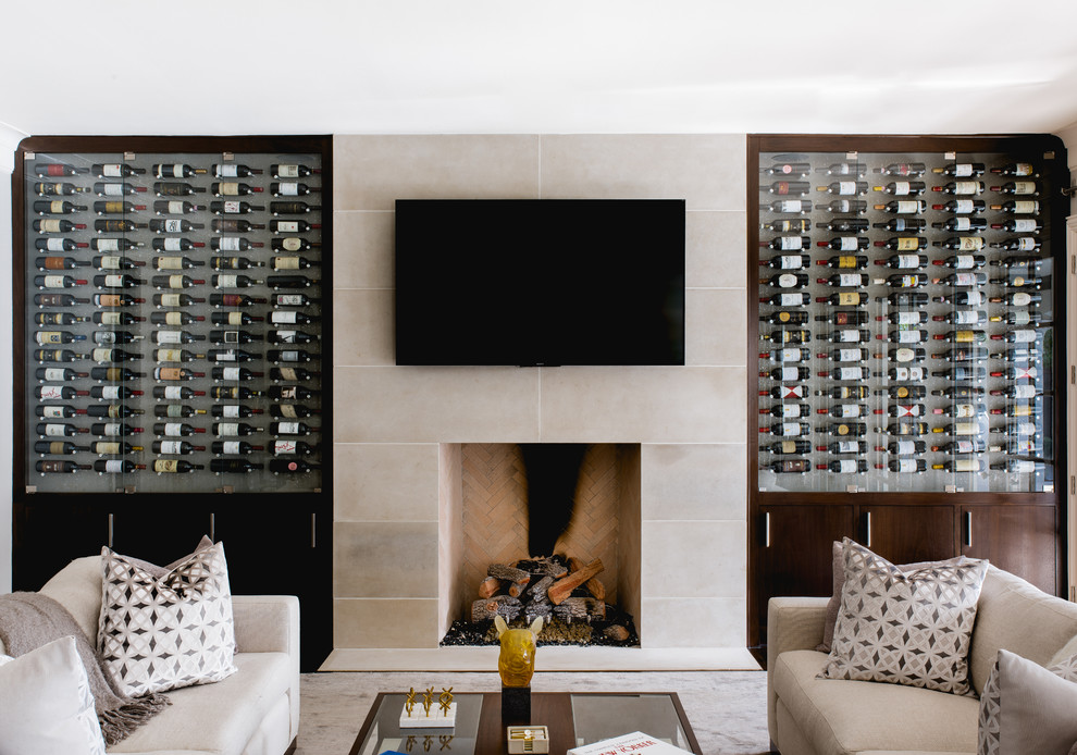 Inspiration for a large transitional enclosed family room remodel in Dallas with a bar, a standard fireplace, a tile fireplace and a wall-mounted tv
