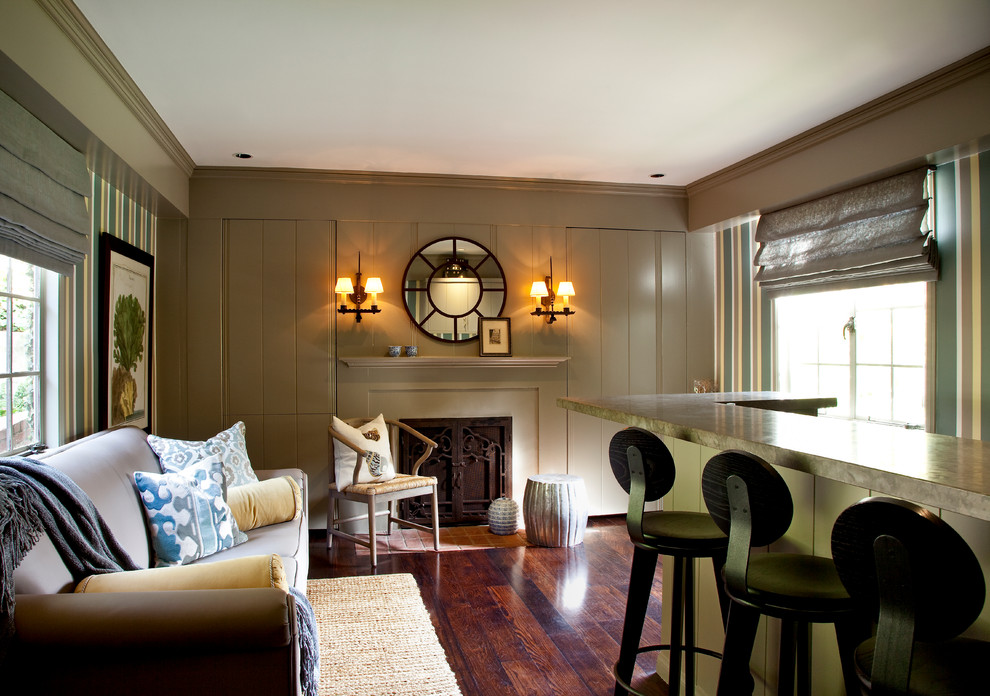 Ejemplo de sala de estar clásica con paredes beige, suelo de madera oscura y todas las chimeneas