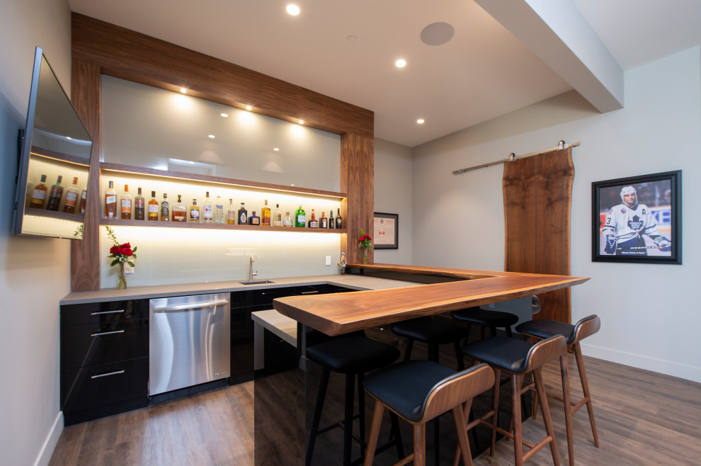 Inspiration for a medium sized contemporary open plan games room in Vancouver with a home bar.