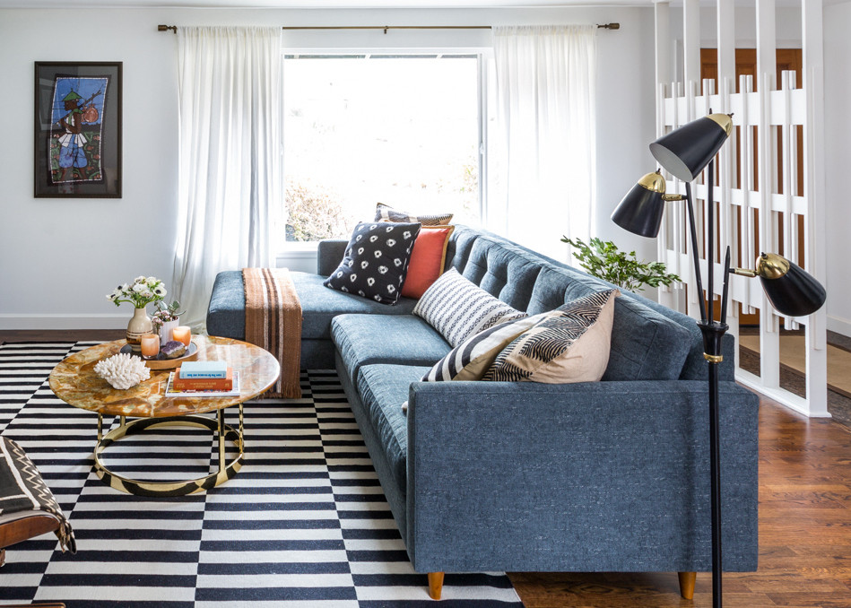 Esempio di un soggiorno minimalista con tappeto
