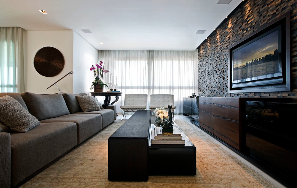 Family room - contemporary open concept family room idea in Other with a wall-mounted tv