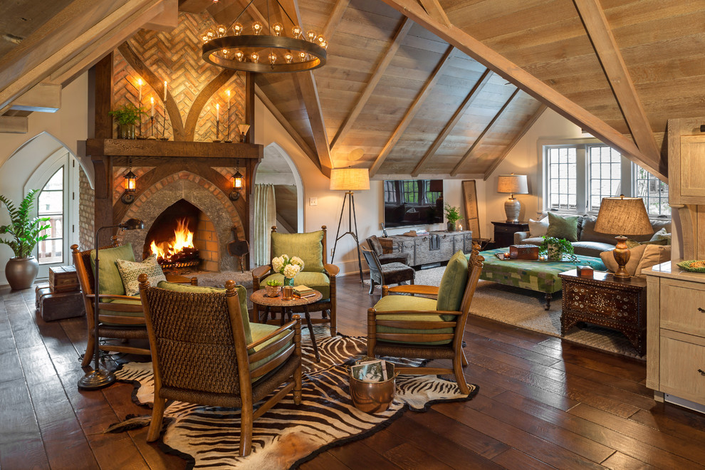 Inspiration for a small eclectic open concept family room remodel in Milwaukee with a standard fireplace