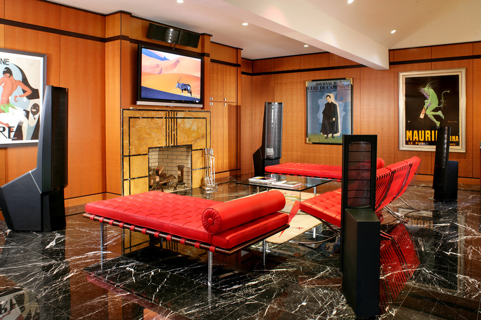 This is an example of a contemporary open plan games room in New York with a standard fireplace, a wall mounted tv, marble flooring and black floors.