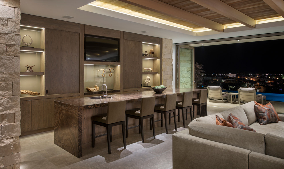 Contemporary games room in Orange County with a home bar.