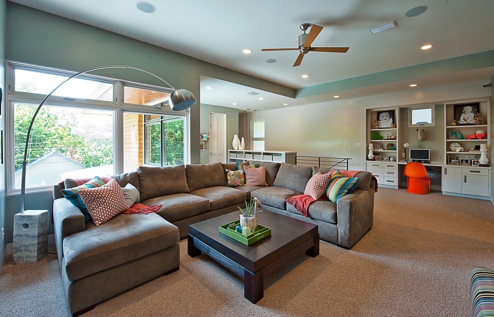 Contemporary mezzanine games room in Austin with blue walls and carpet.