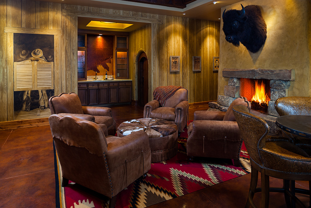 Family room - rustic enclosed family room idea in Other with a bar, brown walls, a standard fireplace and a stone fireplace