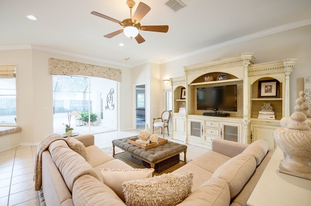 Medium sized classic open plan games room in Tampa with beige walls, porcelain flooring, no fireplace and beige floors.