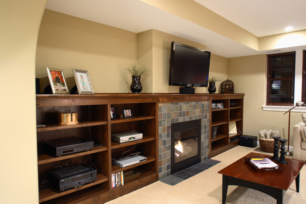 Game room - large craftsman open concept carpeted game room idea in Minneapolis with a standard fireplace, a tile fireplace, a wall-mounted tv and beige walls