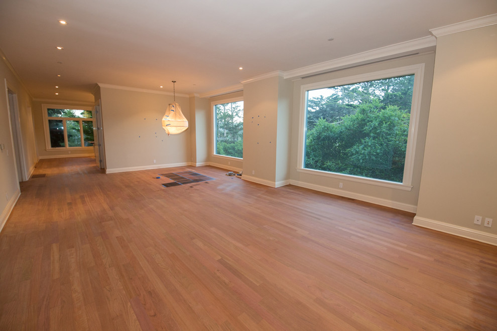Inspiration for a modern games room in Sacramento with medium hardwood flooring and brown floors.