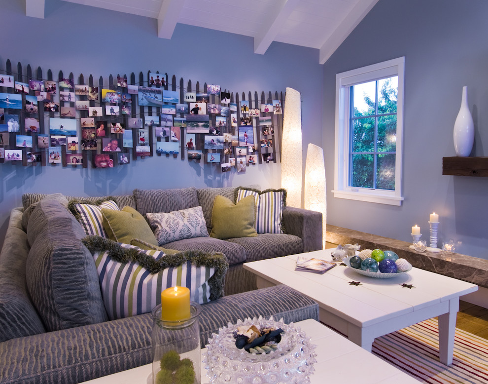 Beach style family room photo in San Francisco with blue walls