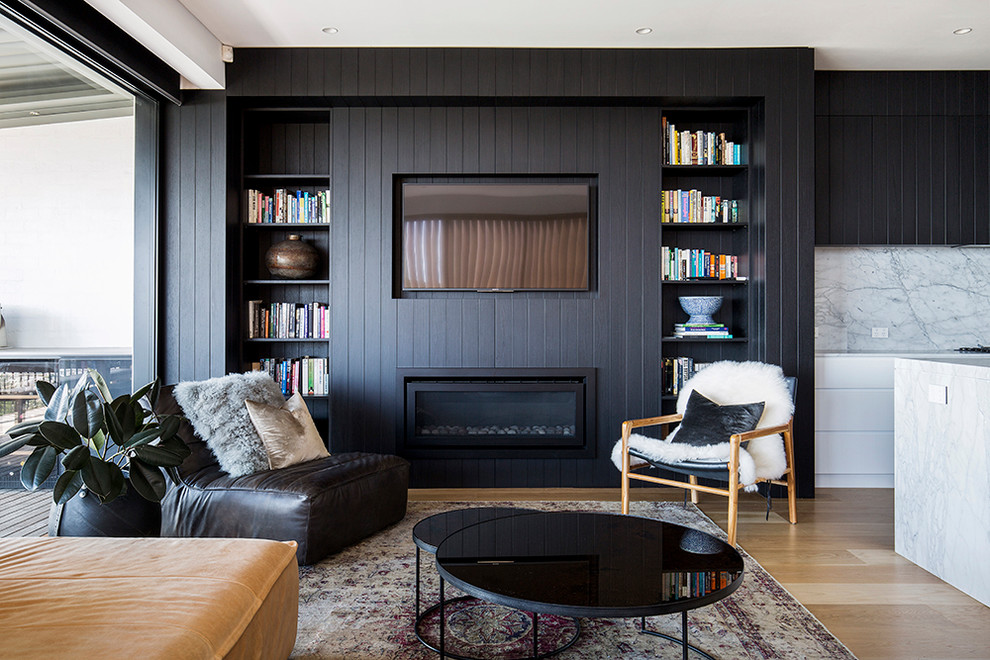 Источник вдохновения для домашнего уюта: гостиная комната в современном стиле с ковром на полу