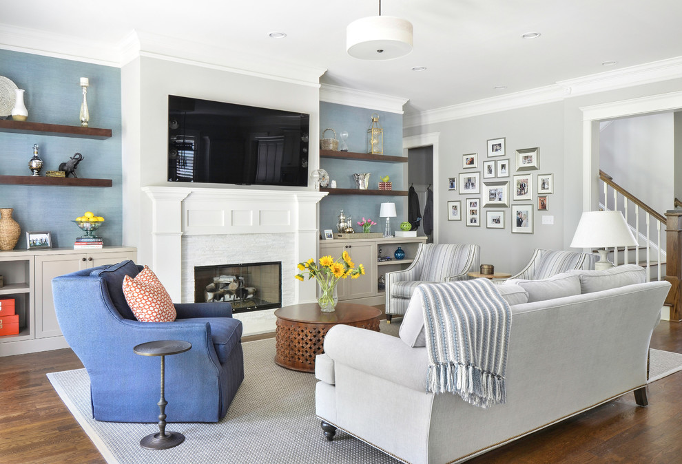 Mid-sized transitional open concept dark wood floor family room photo in Atlanta with a standard fireplace, a stone fireplace, a wall-mounted tv and multicolored walls