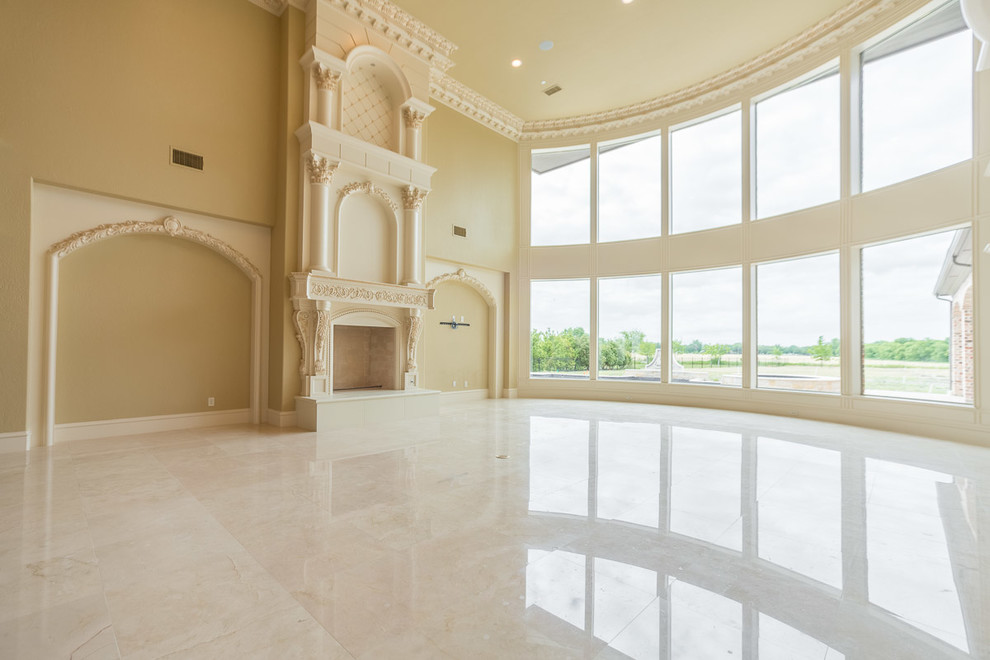 Inspiration for an open plan games room in Dallas with marble flooring, a standard fireplace and a plastered fireplace surround.