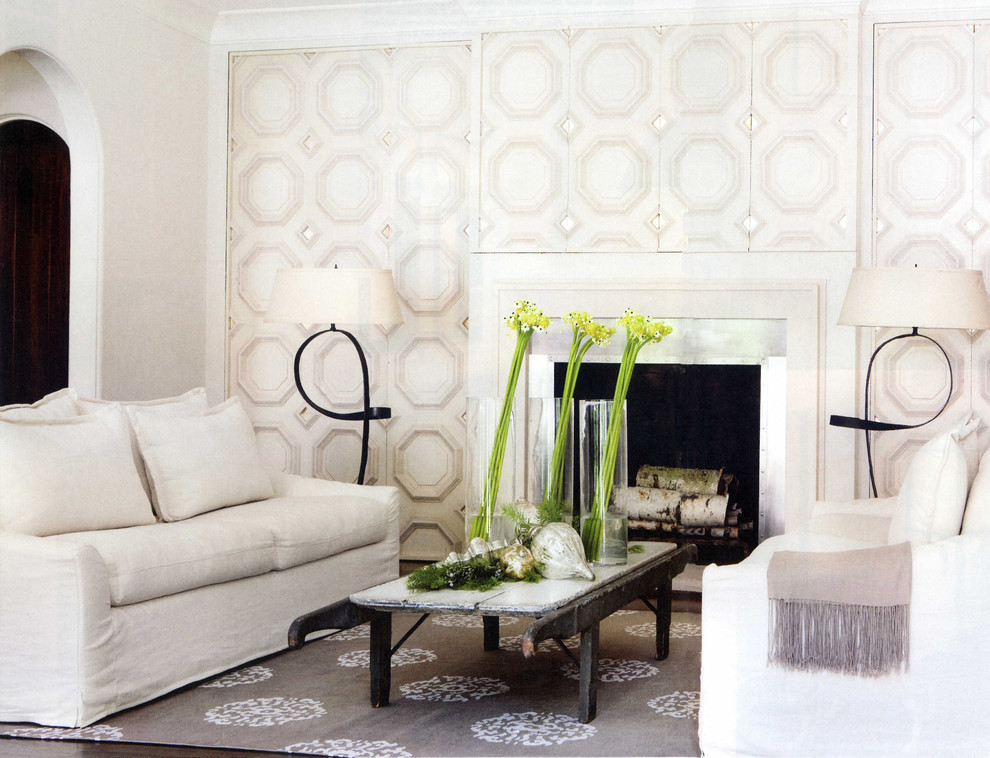 Example of a trendy living room design in Atlanta with beige walls and a standard fireplace