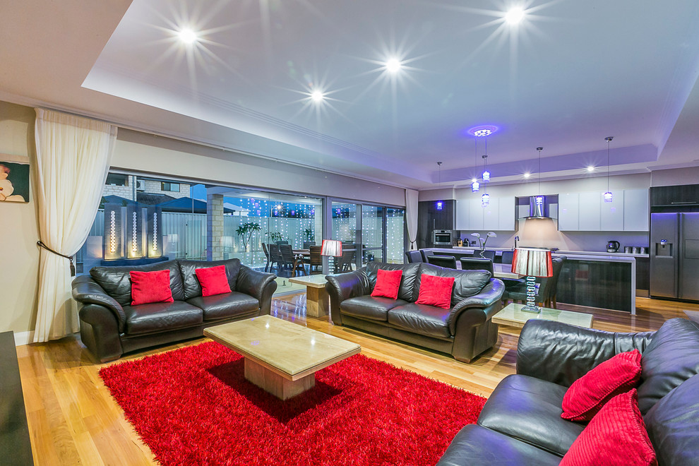 Photo of a large contemporary open plan games room in Perth.