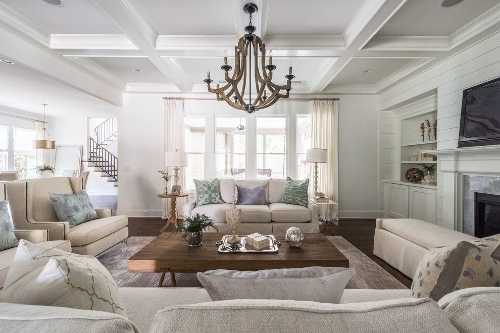 Coastal games room in Atlanta with white walls, dark hardwood flooring, a standard fireplace, a wall mounted tv and brown floors.