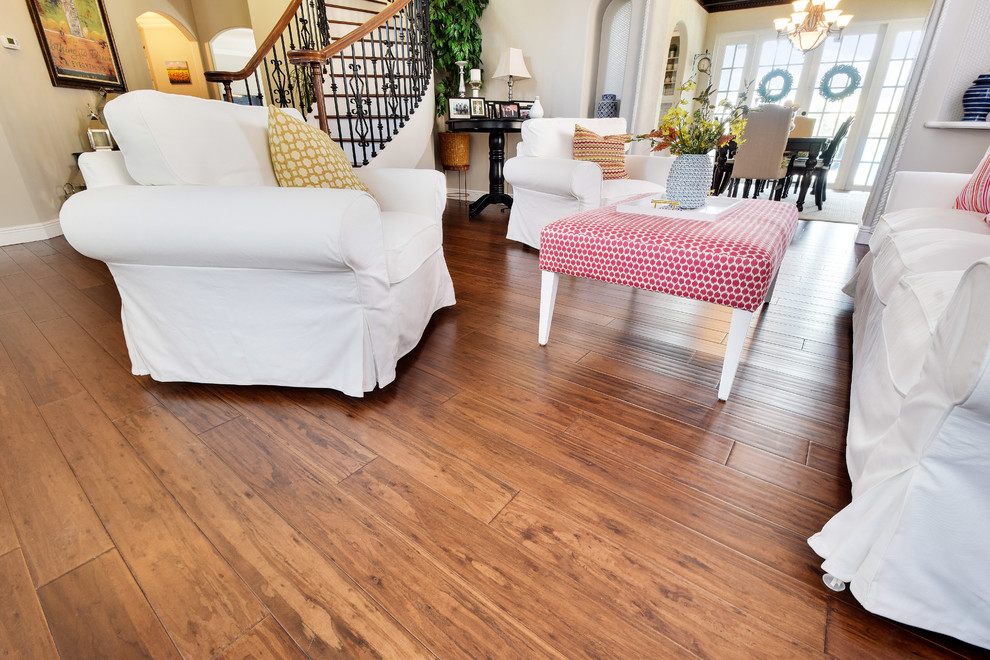 Inspiration for a transitional bamboo floor and brown floor family room remodel in Baltimore