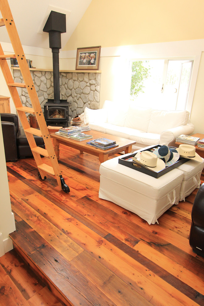 Example of a small mountain style light wood floor family room design in Vancouver