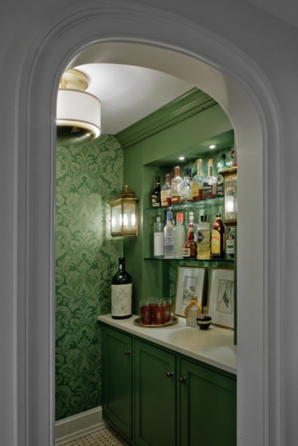 This is an example of a classic home bar in Other.